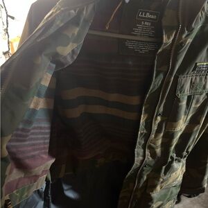 LL Bean Women’s mid-length camo jacket with wool lining